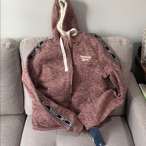 Heathered rose Reebok Sherpa hoodie.